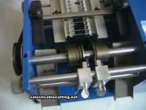 Automatický stroj na řezání, ohýbání a tvarování páskových i volných rezistorů